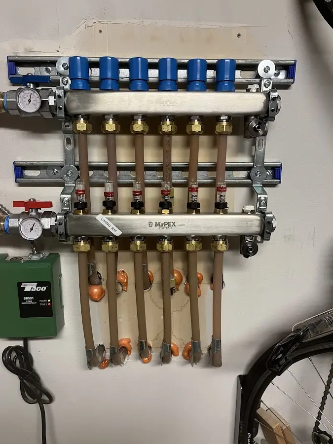 Plumber performing Water Heater Repair at a residential property in Hellertown